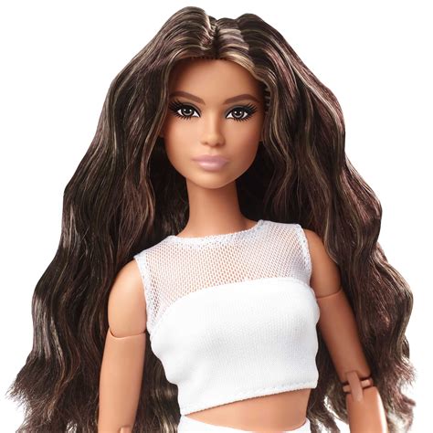 barbie with light brown hair|brown skin barbie dolls.